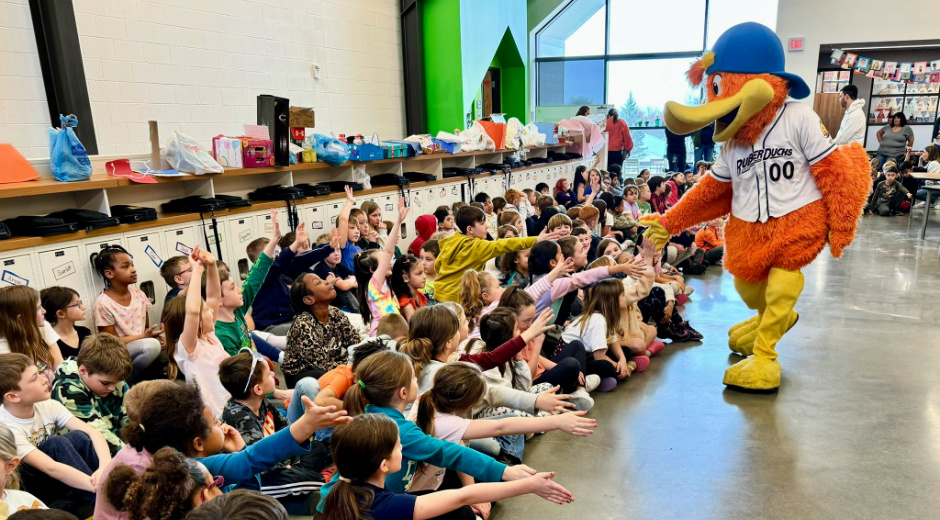 kids with rubber duck mascot